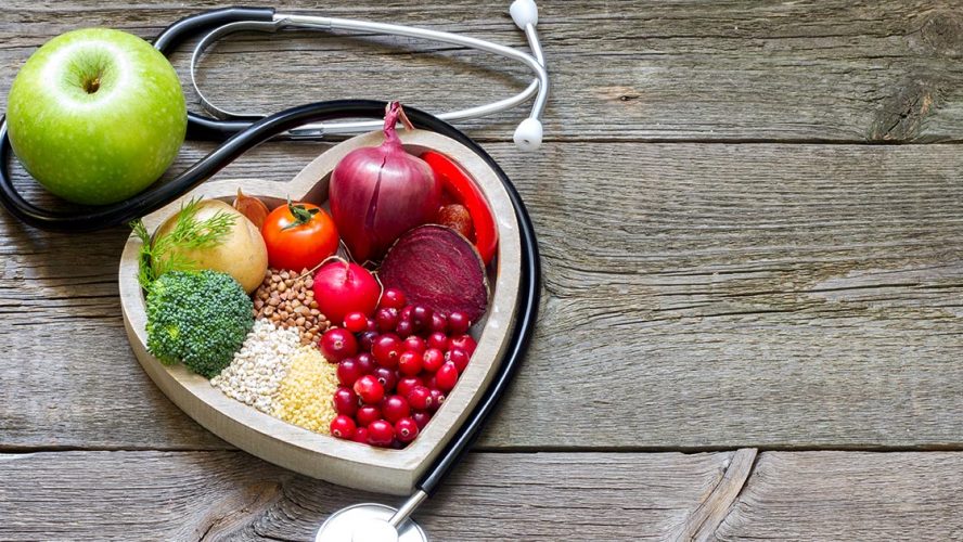 Stethoscope and healthy food