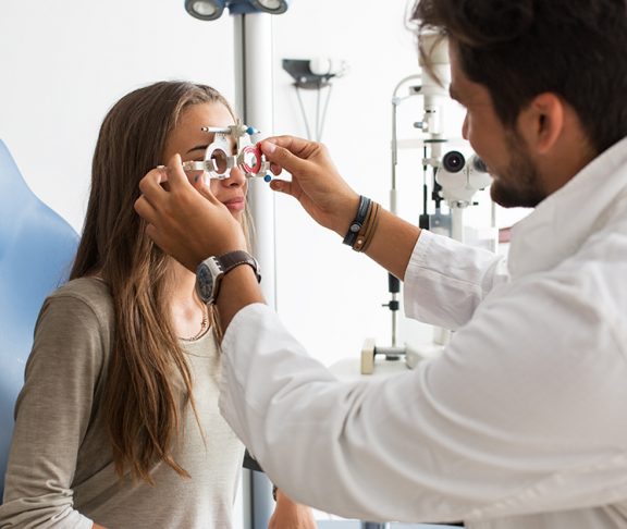A young girl at an optometrist appointment