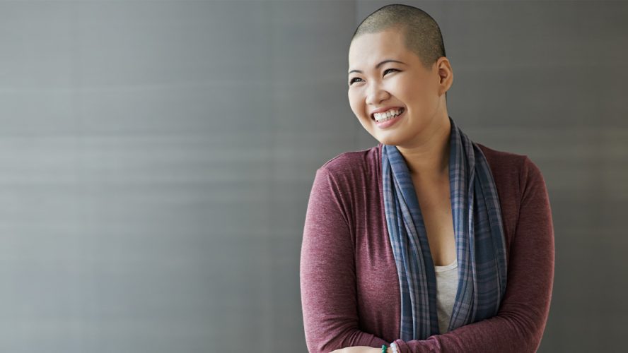 Smiling breast cancer survivor