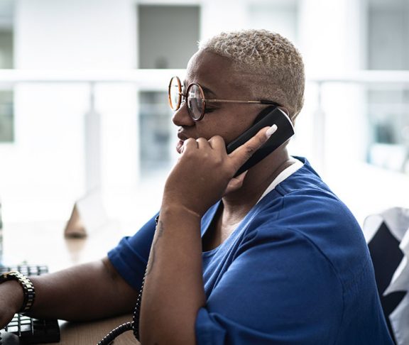 Woman providing mental health support over the phone