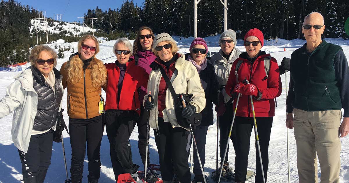 Tapestry residents snowshoeing in Vancouver's local mountains
