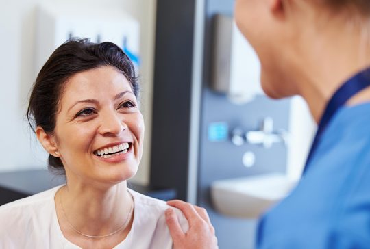 Patient Smiling at Doctor