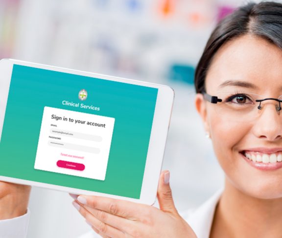 A pharmacist with a tablet showing the account signup page