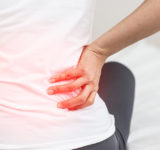 woman with back pain hip pain