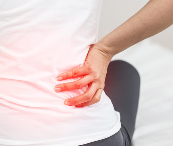 woman with back pain hip pain