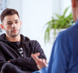 man at a counselling session