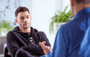 man at a counselling session