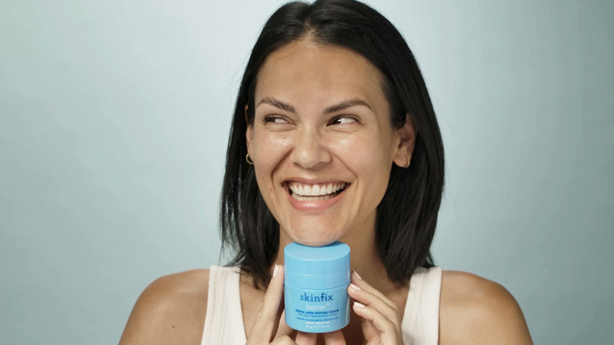 woman smiling with skinfix cream