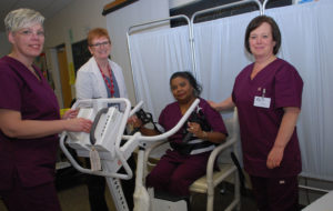 Healthcare workers testing equipment