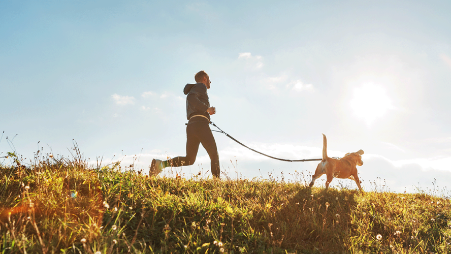 man with allergies enjoying run with dog