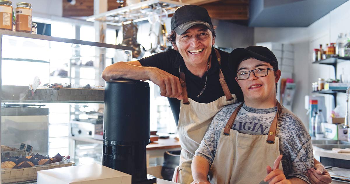 Two men who own a small business, one has Down syndrome