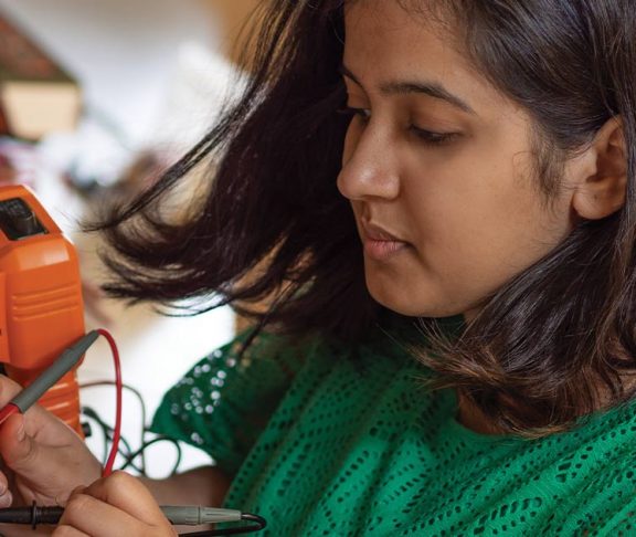Rashmi Prakash working on electronics
