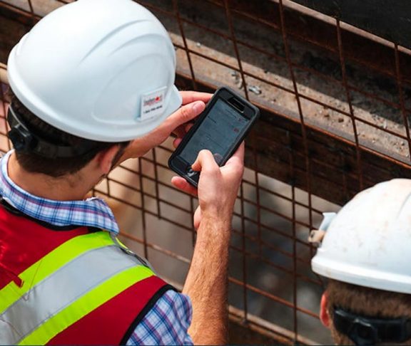 Using the Procore app on a construction site