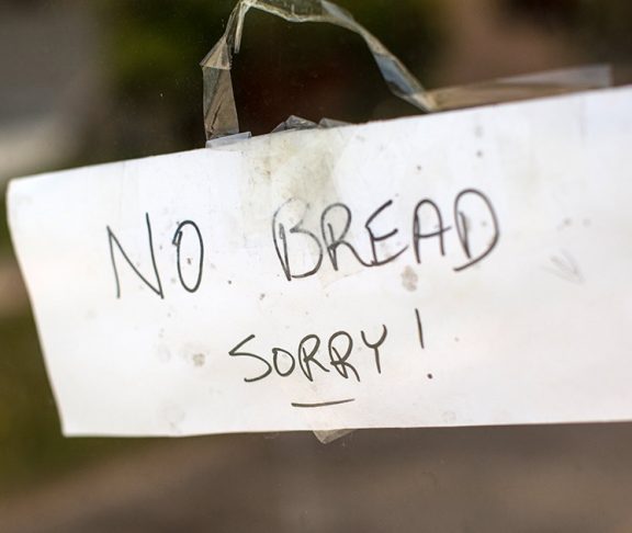 Sign on door that says no bread sorry
