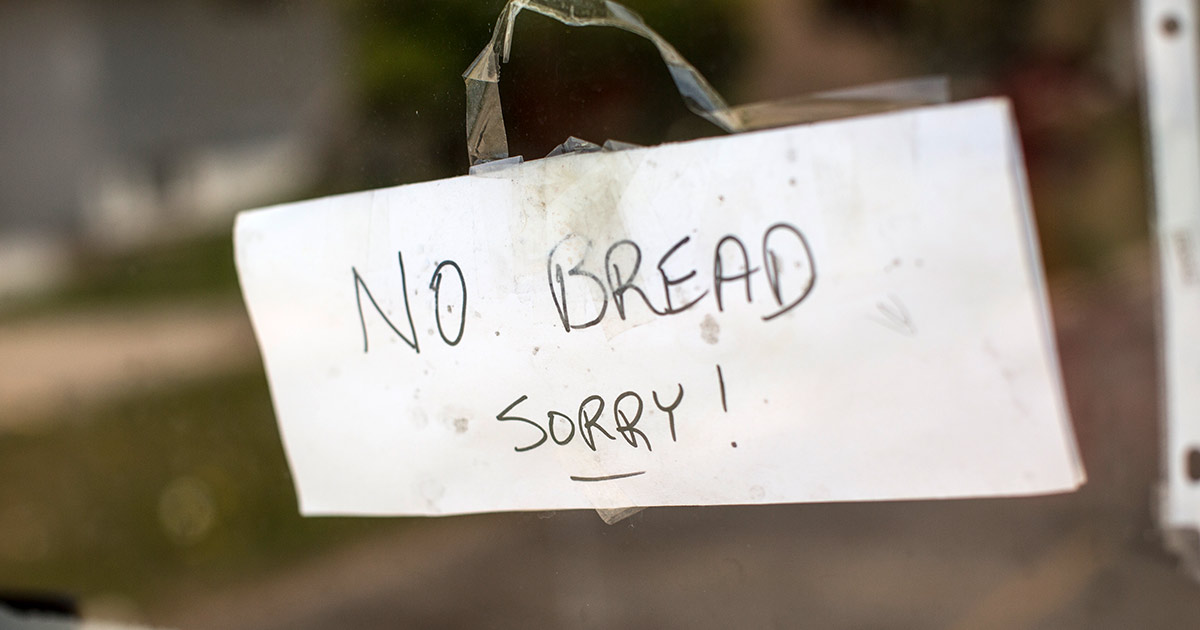 Sign on door that says no bread sorry