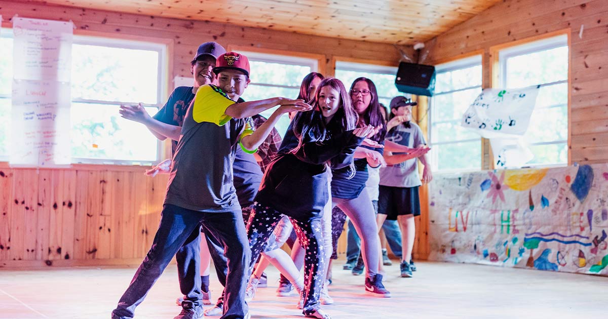 Children dancing at the Right To Play Haliburton Youth Camp