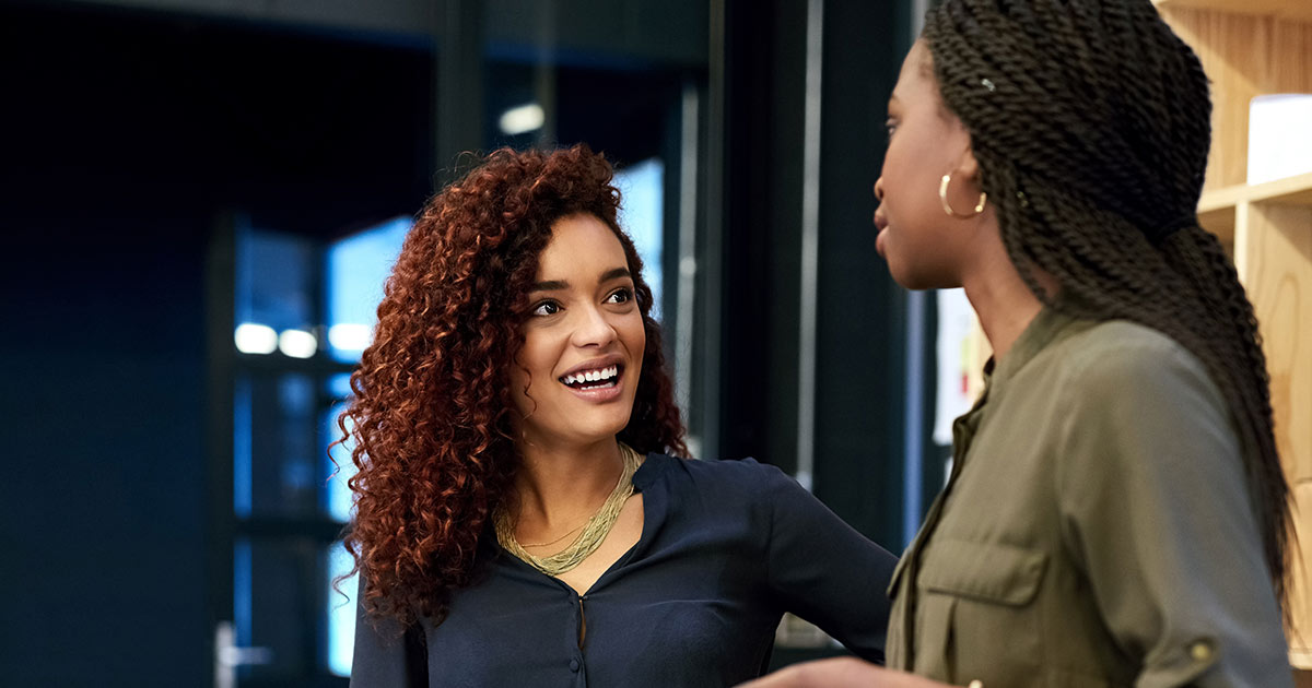 Two Black women having a business conversation