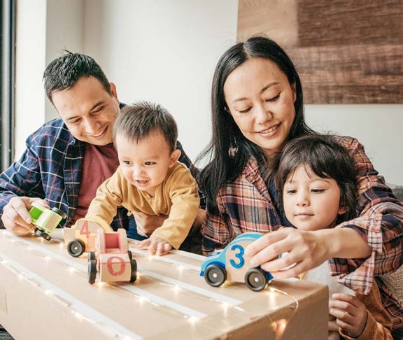 asian family playing toys