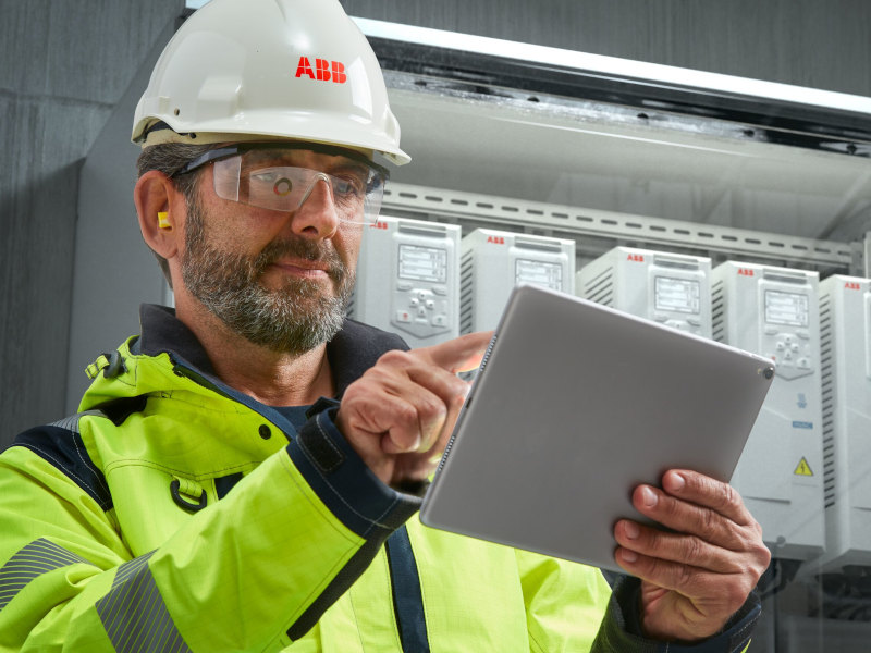 ABB employee using tablet
