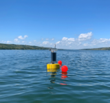 super buoy floating in ocean water