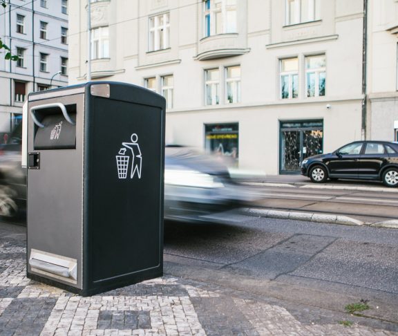 A modern clever trash can on the street in Prague in the Czech Republic. Collection of waste in Europe for subsequent disposal. Eco-friendly waste collection