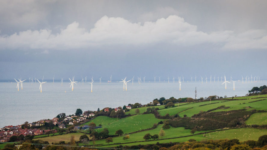 A wind farm in the North sea off the English coast generating electricity