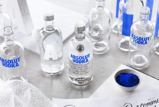 Absolut Vodka bottles on a table top