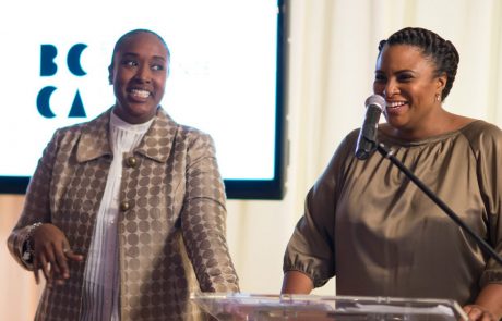 Dr. Jill Andrew and Aisha Fairclough speaking at an event