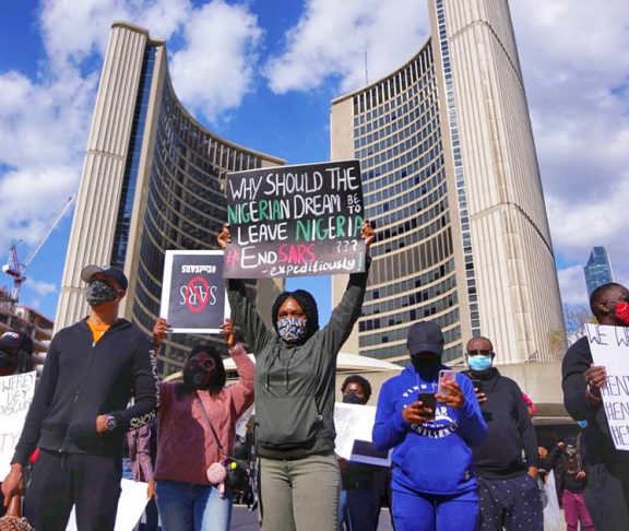 EndSARS protestors at a demonstration in Toronto's Nathan Philips Square