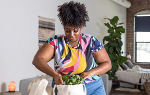 Women back at home after shopping groceries