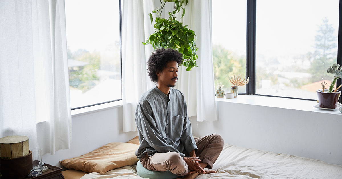 black man meditating