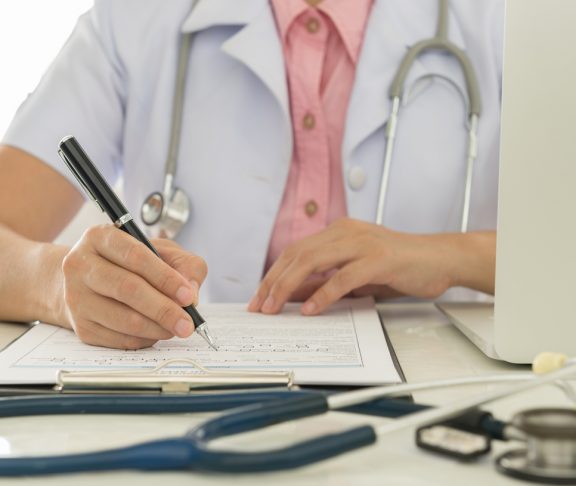 Doctors are recorded patient data for analysis.