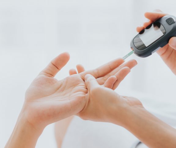 diabetes finger prick test blood sugar