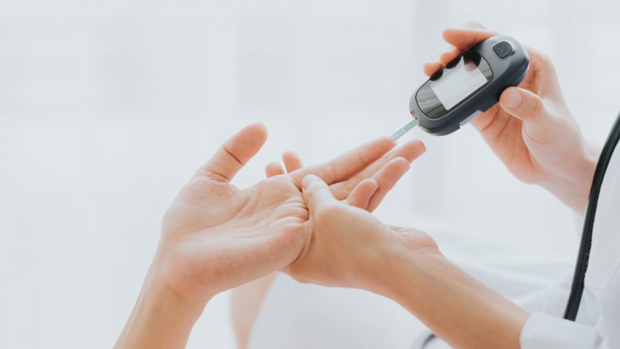 diabetes finger prick test blood sugar