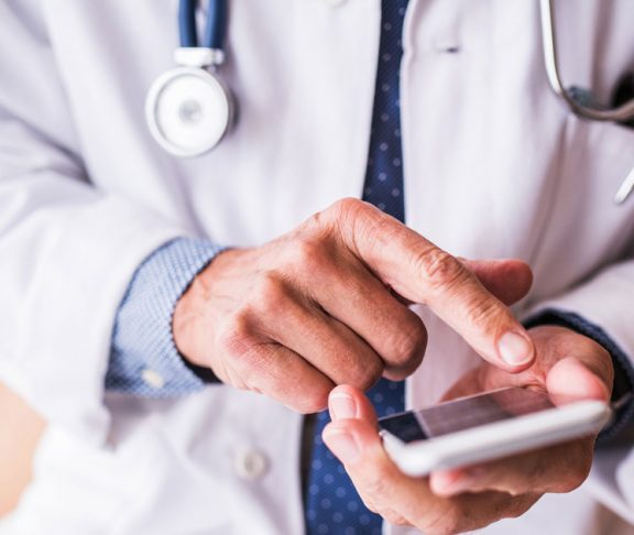 doctor on phone mobile social media