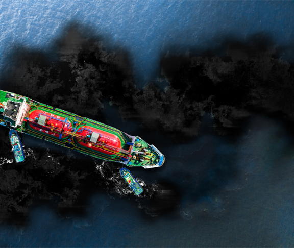 Cargo ship floats atop an ocean oil spill