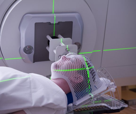 Man Receiving Radiation Therapy for Cancer Treatment