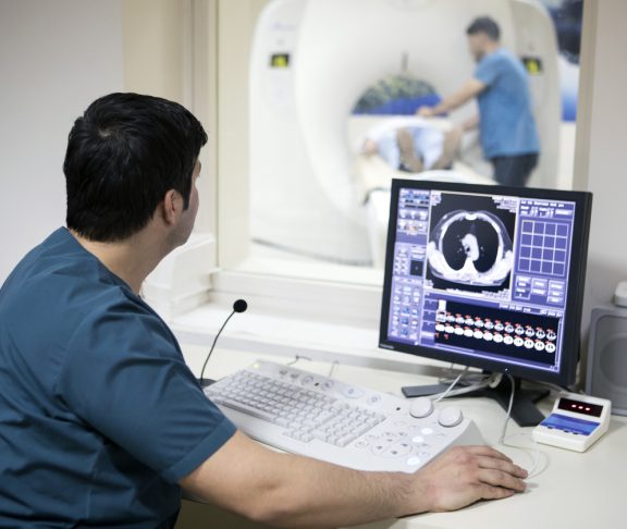 Radiologist reading a CAT scan