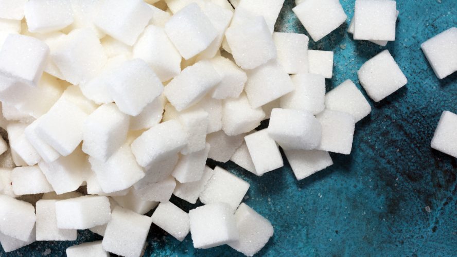 sugar cubes. unhealthy living with white crystal sugar cube