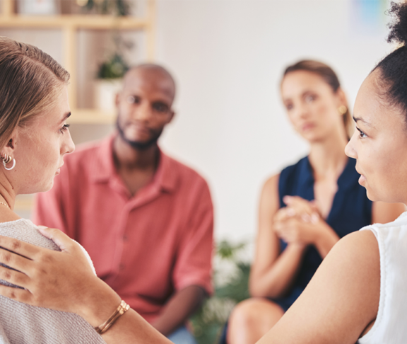 Psychology, mental health and support group with a woman in counseling for help with depression and anxiety with a psychologist she can trust.
