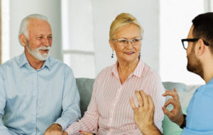 Nurse doctor senior couple care caregiver help assistence retirement home nursing elderly man woman insurance -