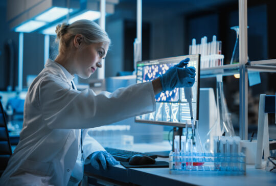 Medical Research Laboratory: Portrait of Female Scientist Working with Samples, using Micro Pipette Analysing Sample.